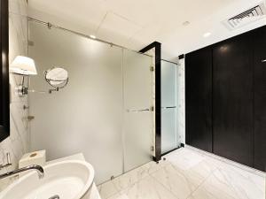 Petals Homes Millennium Atria 1 bedroom with Balcony