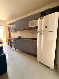 Flamingo Pé na areia - CentroGuaratuba