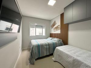 Apartamento compartilhado em Edifício Beach Prime