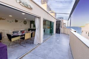 1025 Ampla cobertura duplex na Praia de Bombinhas 50mts do mar