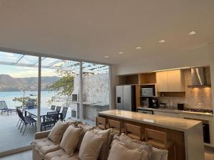 Beach house, pé na areia, vista para o mar e Ilhabela