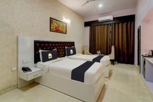 Townhouse OAK Hotel Aradhna Inn Unit By Blue Moon Hotel