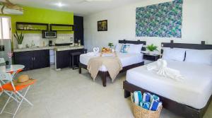 Family Suite with 2 Double Beds with Fast WiFi and Air Conditioning Near Beach 8A