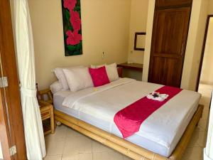 Beachfront Villa Mawar with Private Pool and Sunset View