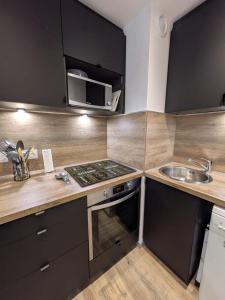 Pied des pistes avec place privée parking securisé - 4-6 pers