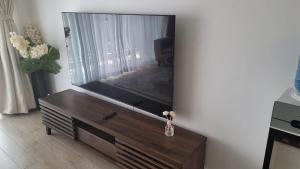 Elegant 2-Bedroom Apartment with Pool & Balcony