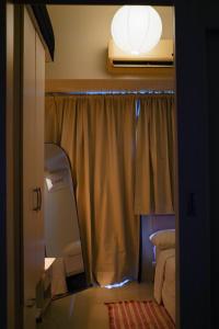 SMDC LIGHT Balcony Smart TV Alexa Cozy Retreat