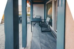 Surfers Oase near Interlaken at lake with pool