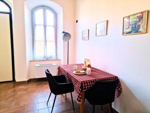 Foschina apartment parking in front of the house