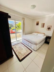 Incrível Apartamento vista mar a poucos passos da praia com 3 dormitórios