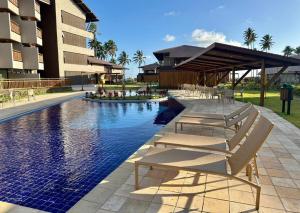 Atlântico Carneiros - Pé na areia próximo da Igrejinha