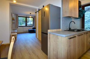 Apartmaji nad potokom