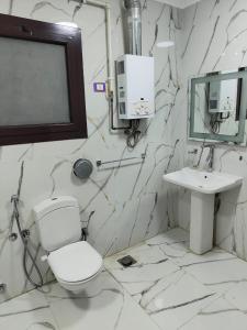 شقة في المهندسين امام نادي الزمالك 3غرفة 3حمام