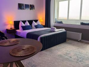 CuxHeaven - modernes Studio-Apartment direkt am Meer mit Pool, Sauna und Massage