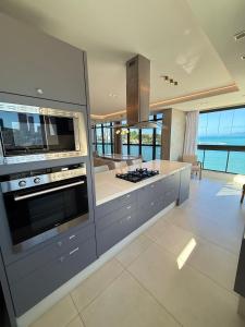 Apartamento Frente Mar com vista praia em Itapema