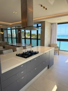 Apartamento Frente Mar com vista praia em Itapema