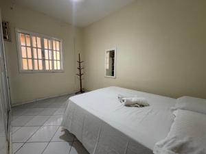 Casa com piscina e churrasqueira para familia