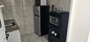 Aconchegante Terreo com ar 12 mil