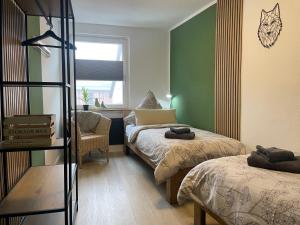 Wolfsrudel - zentrales Motto Apartment