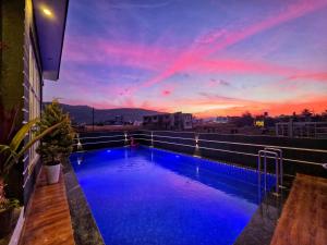 ll EMPYREAN STAYS ll G0DFATHER VILLA ll MINI PUB ll 4BHK ll AC ll LARGEST POOL ll