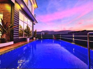 ll EMPYREAN STAYS ll G0DFATHER VILLA ll MINI PUB ll 4BHK ll AC ll LARGEST POOL ll