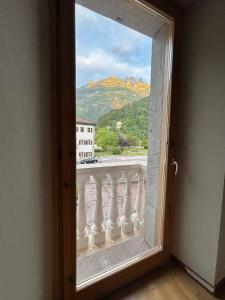 Refuge in the Belluno Dolomites with a view of Boite