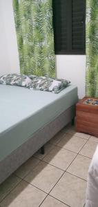 Casa simples e espaçosa próxima à Praia Grande e ao Itaguá