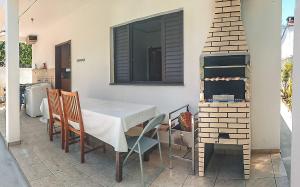 Casa simples e espaçosa próxima à Praia Grande e ao Itaguá