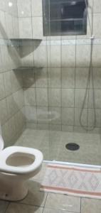 Casa simples e espaçosa próxima à Praia Grande e ao Itaguá