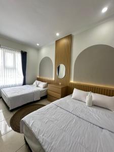 Villa Rumbay - Dekat BNS, JATIM PARK - 4 Rooms