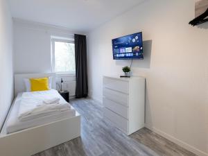 BudgetRoom Modernes Apartment mit 3 Schlafzimmern