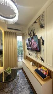 Podomoro Golf View 2 Bedroom by Ensroom