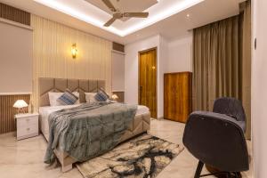 ELIVAAS Vedaaz Farms Pet-friendly 4-BHK Villa With Private Outdoor Pool and Garden area