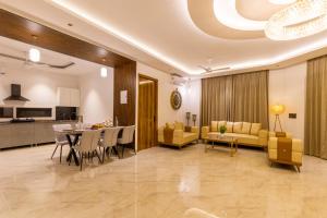 ELIVAAS Vedaaz Farms Pet-friendly 4-BHK Villa With Private Outdoor Pool and Garden area