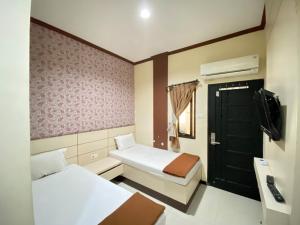 Lily Guest House Syariah RedPartner