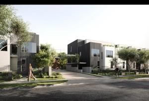 Brand new central 3 bedroom along the beach