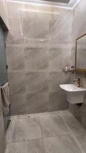 Elegant studio with 65-inch screen and outdoor seating