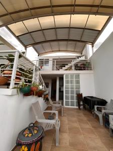 Penthouse con habitación privada y cine nocturno