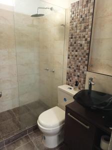 Penthouse con habitación privada y cine nocturno