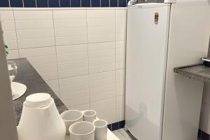 Kitnet na rua da UFV com Smart TV e Garagem