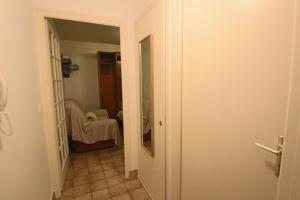 Studio 24 m2 le grand passage centre-ville terrasse climatisation parking