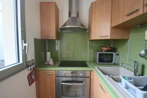 Studio 24 m2 le grand passage centre-ville terrasse climatisation parking