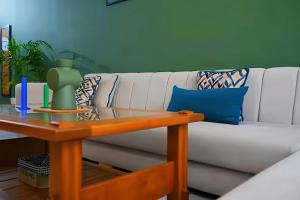 Maya Suites - Cozy interior with a sunny balcony