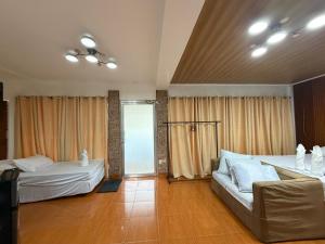 Tiny Home near the Beach Tubigan by Cleofe