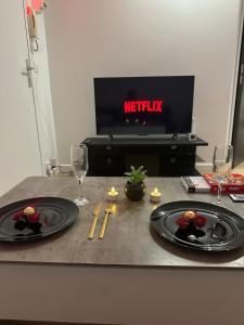 Jacuzzi Privé & Cinéma - Suite Romantique