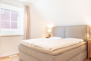 Ferienwohnung Lütt Strandhuus - Scharbeutz