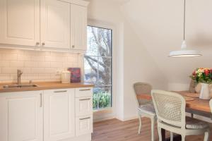 Ferienwohnung Lütt Strandhuus - Scharbeutz