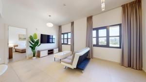 Vacationer Holiday Homes l Cozy 1 Bed l Jumeirah Golf Estate l Free Pool, Gym