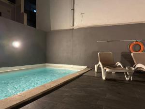 Central Oasis with Private Pool and Lounge Area