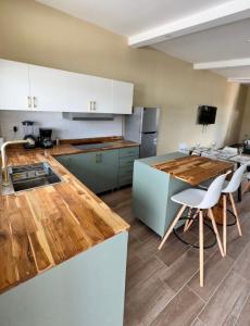 Pristine Rooftop 2 Bedroom Apartment centrally located with a view